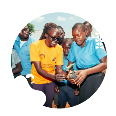 keeping green_train_a_girl _uganda_organization_tree_planting_with_kids